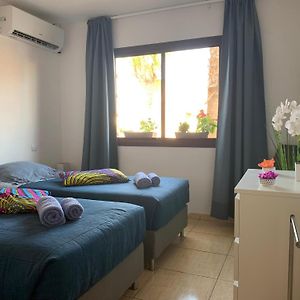 Bedroom With Shared Bathroom And Swimming Pool